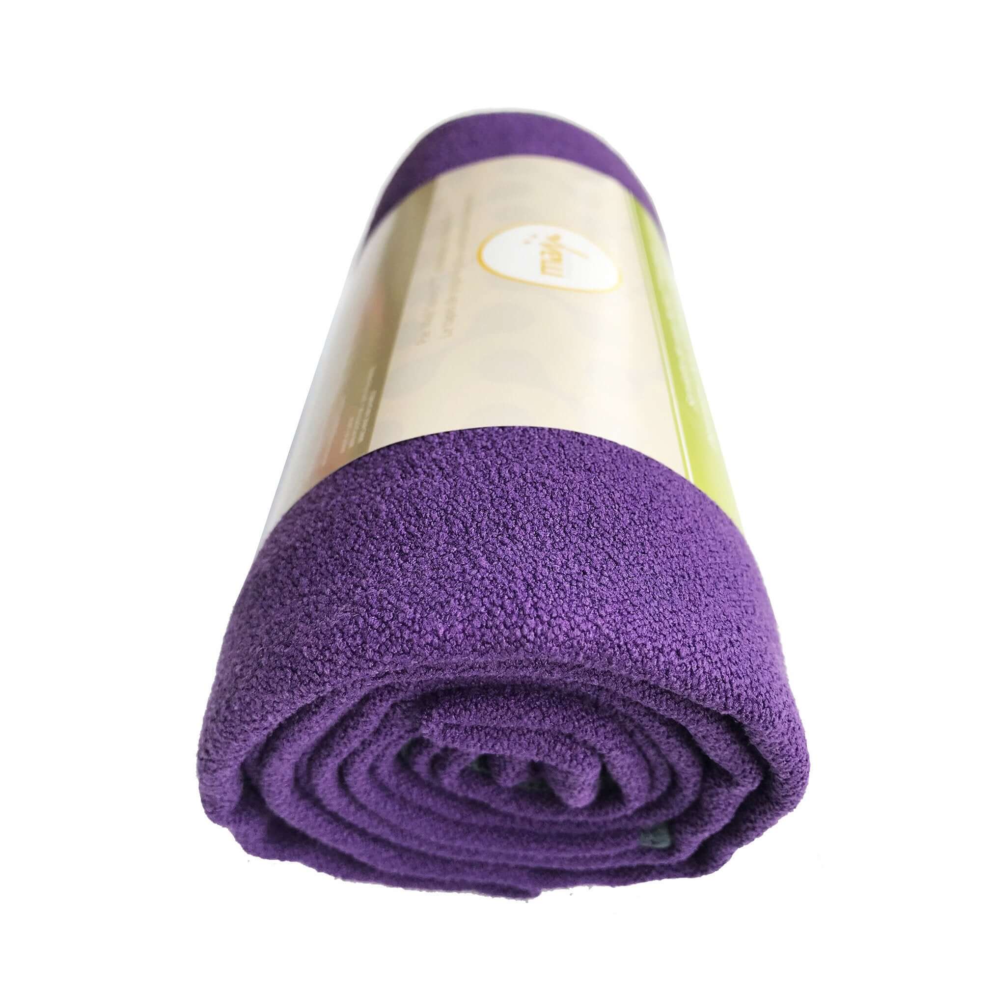 NoSkid Sand-Washed Yoga Mat Towel in various colors, showcasing its soft suede-like texture and slip-resistant surface.